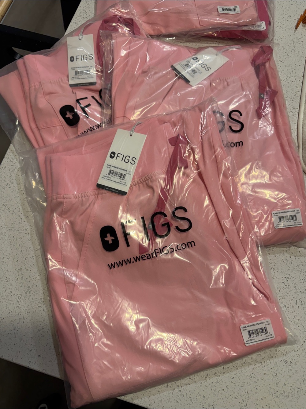 FIGS Isabel High Waisted Scrub Pants in Fight Club Pink